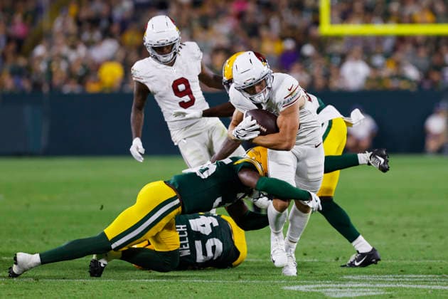 GREEN BAY, WI - AUGUST 28: Arizona Cardinals running back Evan Hull (43) blasts through defenders during a preseason game between the Green Bay Packers and the Arizona Cardinals on August 28, 2026 at Lambeau Field, in Green Bay, WI. (Photo by Larry Radloff Icon Sportswire) NFL, American Football Herren, USA AUG 28 Cardinals at Packers EDITORIAL USE ONLY Icon202608284335