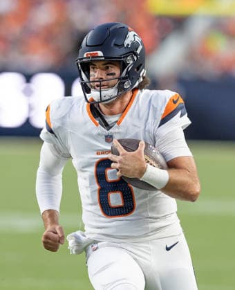 August 29, 2026, Denver, Colorado, USA: Broncos QB JARRETT STIDHAM runs for a first down during the 1st. Half at Empower Field at Mile High Friday evening. Broncos beat the Vikings 34-6 in Pre-Season play. Credit Image: ZUMA Press Wire) Denver USA - ZUMAav4_ 20260829_zaf_av4_003 Copyright: xHectorxAcevedox