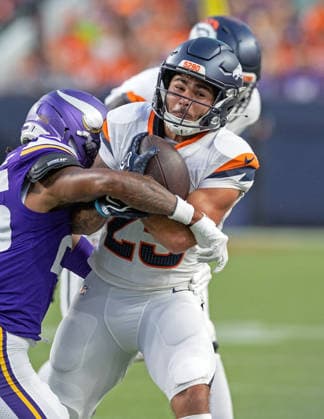 August 29, 2026, Denver, Colorado, USA: Broncos RB CODY SCHRADER runs for tough yardage during the 1st. Half at Empower Field at Mile High Friday evening. Broncos beat the Vikings 34-6 in Pre-Season play. Credit Image: ZUMA Press Wire) Denver USA - ZUMAav4_ 20260829_zaf_av4_007 Copyright: xHectorxAcevedox