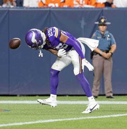 August 29, 2026, Denver, Colorado, USA: Vikings SKAHLIF HALLASSIE slams the football to the ground after getting a pic 6 for his team during the 1st. Half at Empower Field at Mile High Friday evening. Broncos beat the Vikings 34-6 in Pre-Season play. Credit Image: ZUMA Press Wire) Denver USA - ZUMAav4_ 20260829_zaf_av4_009 Copyright: xHectorxAcevedox