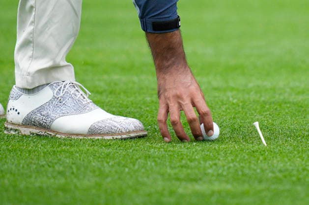 SUTTON COLDFIELD, ENGLAND - AUG 29: Yuvraj Sandhu (IND) marks and replaces his ball due to the wet conditions during delayed play in Round 2 at the 2026 Husqvarna British Masters at The Belfry, Sutton Coalfield on August 29, 2026 in Warwickshire, England The 2026 Husqvarna British Masters