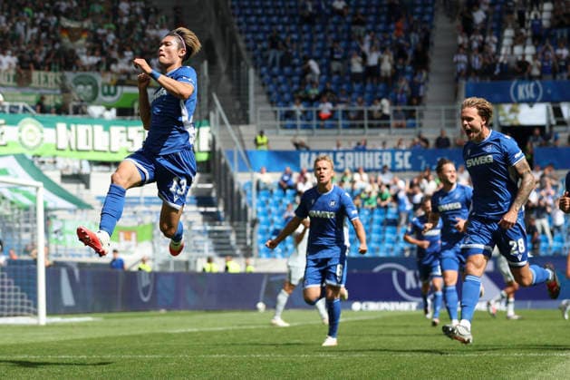 Shio Fukuda (Karlsruher SC) Torjubel, jubelt nach seinem Treffer zum 1:0 waehrend des Spiels der 2. Bundesliga zwischen Karlsruher SC und VfL Wolfsburg, BBBank Wildpark am 29. August 2026 in Karlsruhe, Deutschland. (Foto von Oliver Kaelke DeFodi Images) +++ Shio Fukuda (Karlsruher SC) celebrates after scoring his team s first goal during the 2nd Bundesliga match between Karlsruher SC and VfL Wolfsburg at BBBank Wildpark on August 29, 2026 in Karlsruhe, Germany. (Photo by Oliver Kaelke DeFodi Images) DFB DFL REGULATIONS PROHIBIT ANY USE OF PHOTOGRAPHS AS IMAGE SEQUENCES AND OR QUASI-VIDEO. (Photo by Oliver Kaelke DeFodi Images) - *** Shio Fukuda of Karlsruher SC celebrates after scoring his team s first goal, making the score 1–0, during the 2. Bundesliga match between Karlsruher SC and VfL Wolfsburg, BBBank Wildpark on August 29, 2026, in Karlsruhe, Germany. Photo by Oliver Kaelke, DeFodi Images. Shio Fukuda of Karlsruher SC celebrates after scoring his team’s first goal during the 2. Bundesliga match between Karlsruher SC and VfL Wolfsburg at BBBank Wildpark on August 29, 2026 in Karlsruhe, Germany. Photo by Oliver Kaelke, DeFodi Images. DFB and DFL regulations prohibit any use of photographs as image sequences and or quasi-video. Photo by Oliver Kaelke, DeFodi Images.