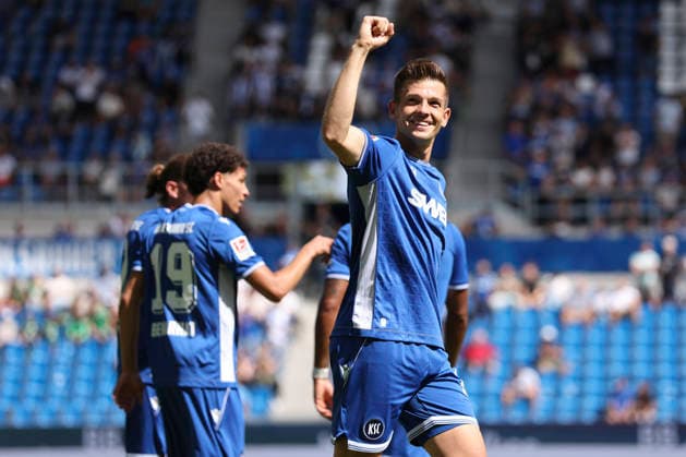 Marvin Wanitzek (Karlsruher SC) Torjubel, jubelt nach seinem Treffer zum 2:1 waehrend des Spiels der 2. Bundesliga zwischen Karlsruher SC und VfL Wolfsburg, BBBank Wildpark am 29. August 2026 in Karlsruhe, Deutschland. (Foto von Oliver Kaelke DeFodi Images) +++ Marvin Wanitzek (Karlsruher SC) celebrates after scoring his team s second goal during the 2nd Bundesliga match between Karlsruher SC and VfL Wolfsburg at BBBank Wildpark on August 29, 2026 in Karlsruhe, Germany. (Photo by Oliver Kaelke DeFodi Images) DFB DFL REGULATIONS PROHIBIT ANY USE OF PHOTOGRAPHS AS IMAGE SEQUENCES AND OR QUASI-VIDEO. (Photo by Oliver Kaelke DeFodi Images) - *** Marvin Wanitzek of Karlsruher SC celebrates after scoring his team s second goal, making the score 2–1, during the 2. Bundesliga match between Karlsruher SC and VfL Wolfsburg, BBBank Wildpark on August 29, 2026, in Karlsruhe, Germany. Photo by Oliver Kaelke, DeFodi Images. Marvin Wanitzek of Karlsruher SC celebrates after scoring his team’s second goal during the 2nd Bundesliga match between Karlsruher SC and VfL Wolfsburg at BBBank Wildpark on August 29, 2026 in Karlsruhe, Germany. Photo by Oliver Kaelke, DeFodi Images. DFB and DFL regulations prohibit any use of photographs as image sequences and or quasi-video. Photo by Oliver Kaelke, DeFodi Images.