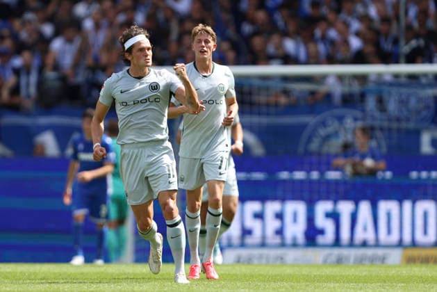Fabian Reese (VFL Wolfsburg) Torjubel, jubelt nach seinem Treffer zum 2:2 waehrend des Spiels der 2. Bundesliga zwischen Karlsruher SC und VfL Wolfsburg, BBBank Wildpark am 29. August 2026 in Karlsruhe, Deutschland. (Foto von Oliver Kaelke DeFodi Images) +++ Fabian Reese (VFL Wolfsburg) celebrates after scoring his team s second goal during the 2nd Bundesliga match between Karlsruher SC and VfL Wolfsburg at BBBank Wildpark on August 29, 2026 in Karlsruhe, Germany. (Photo by Oliver Kaelke DeFodi Images) DFB DFL REGULATIONS PROHIBIT ANY USE OF PHOTOGRAPHS AS IMAGE SEQUENCES AND OR QUASI-VIDEO. (Photo by Oliver Kaelke DeFodi Images) - *** Fabian Reese of VFL Wolfsburg celebrates his goal, making the score 2–2, during the 2. Bundesliga match between Karlsruher SC and VfL Wolfsburg, BBBank Wildpark on August 29, 2026, in Karlsruhe, Germany. Photo by Oliver Kaelke, DeFodi Images. Fabian Reese of VFL Wolfsburg celebrates after scoring his team’s second goal during the 2. Bundesliga match between Karlsruher SC and VfL Wolfsburg at BBBank Wildpark on August 29, 2026 in Karlsruhe, Germany. Photo by Oliver Kaelke, DeFodi Images. DFB and DFL regulations prohibit any use of photographs as image sequences and or quasi-video. Photo by Oliver Kaelke, DeFodi Images.