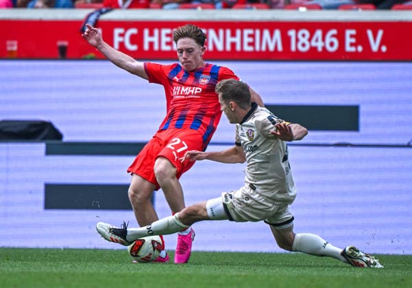 29.08.2026, xemx, Fussball 2.Bundesliga, 1.FC Heidenheim - Dynamo Dresden v.l. Michael Heule (1.FC Heidenheim), Niklas Hauptmann (Dynamo Dresden) Zweikampf, Aktion, action, battle for the ball (DFL DFB REGULATIONS PROHIBIT ANY USE OF PHOTOGRAPHS as IMAGE SEQUENCES and or QUASI-VIDEO) Heidenheim *** August 29, 2026, xemx, Soccer 2. Bundesliga, 1. FC Heidenheim vs. Dynamo Dresden, photo by Michael Heule, 1. FC Heidenheim, Niklas Hauptmann, Dynamo Dresden, tackle, action, battle for the ball. DFL and DFB regulations prohibit any use of photographs as image sequences and or quasi-video. Heidenheim