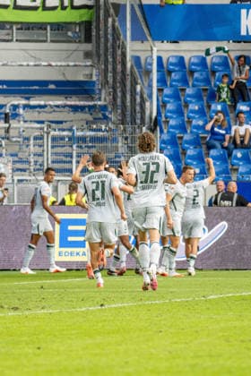 29.08.2026, xdaymx, Fussball 2.Bundesliga, Karlsruher SC - VfL Wolfsburg. Mannschaft vom VFL Wolfsburg jubelt nach dem 2:4 Treffer vor den mitgereistens Fans (DFL DFB REGULATIONS PROHIBIT ANY USE OF PHOTOGRAPHS as IMAGE SEQUENCES and or QUASI-VIDEO) Karlsruhe *** August 29, 2026, xdaymx, Soccer, 2. Bundesliga, Karlsruher SC vs. VfL Wolfsburg: The VfL Wolfsburg team celebrates after scoring 2–4 in front of their traveling fans. DFL and DFB regulations prohibit any use of photographs as image sequences and or quasi-video. Karlsruhe