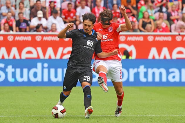 Mainz, Deutschland 29. August 2026: 1. BL - 2026 2027 - Sp. 1 - 1. FSV Mainz 05 gegen SC Paderborn 07 Im Bild: v. li. im Zweikampf Laurin Ulrich (SCP) gegen Fabio Gruber (FSV). DFL regulations prohibit any use of photographs as image sequences and or quasi-video Mewa Arena Rheinland - Pfalz *** Mainz, Germany, August 29, 2026, Bundesliga 1, 2026–2027 Season, Matchday 1, 1:0, FSV Mainz 05 vs. SC Paderborn 07. Pictured from left in a tackle: Laurin Ulrich (SCP) vs. Fabio Gruber (FSV). DFL regulations prohibit any use of photographs as image sequences and or quasi-video footage. Mewa Arena, Rhineland-Palatinate Copyright: xFotostandx xRacochax