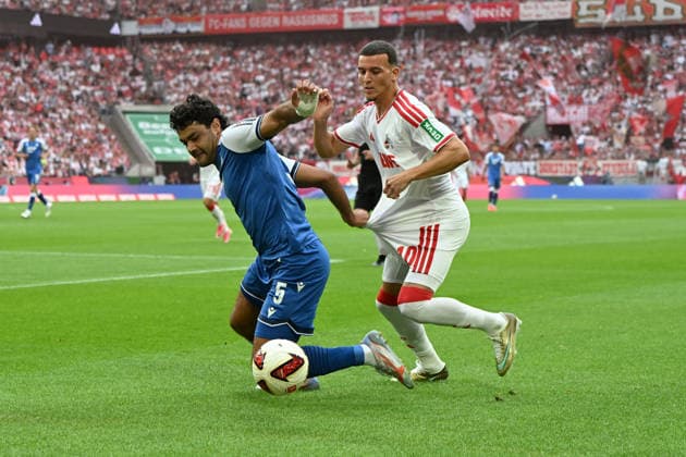 Ozan Kabak (TSG Hoffenheim) und Said El Mala (1. FC Koeln) im Zweikampf waehrend des Spiels der 1. Bundesliga zwischen 1. FC Koeln und TSG Hoffenheim, RheinEnergieStadion am 29. August 2026 in Koeln, Deutschland. (Foto von Ralf Treese DeFodi Images) +++ Ozan Kabak (TSG Hoffenheim) und Said El Mala (1. FC Koeln) battle for the ball during the Bundesliga match between 1. FC Koeln and TSG Hoffenheim at RheinEnergieStadion on August 29, 2026 in Cologne, Germany. (Photo by Ralf Treese DeFodi Images) DFB DFL REGULATIONS PROHIBIT ANY USE OF PHOTOGRAPHS AS IMAGE SEQUENCES AND OR QUASI-VIDEO. (Photo by Ralf Treese DeFodi Images) - *** Ozan Kabak of TSG Hoffenheim and Said El Mala of 1. FC Köln battle for the ball during the Bundesliga match between 1. FC Köln and TSG Hoffenheim at RheinEnergieStadion on August 29, 2026, in Cologne, Germany. Photo by Ralf Treese, DeFodi Images. Ozan Kabak of TSG Hoffenheim and Said El Mala of 1. FC Köln battle for the ball during the Bundesliga match between 1. FC Köln and TSG Hoffenheim at RheinEnergieStadion on August 29, 2026 in Cologne, Germany. Photo by Ralf Treese, DeFodi Images. DFB and DFL regulations prohibit any use of photographs as image sequences and or quasi-video. Photo by Ralf Treese, DeFodi Images.