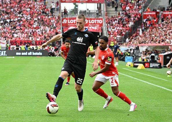 29.08.2026, xsltx, Fussball 1.Bundesliga, FSV Mainz 05 - SC Paderborn v.l. Tjark Scheller (SC Paderborn 07), Phillipp Mwene (1. FSV Mainz 05) (DFL DFB REGULATIONS PROHIBIT ANY USE OF PHOTOGRAPHS as IMAGE SEQUENCES and or QUASI-VIDEO) *** August 29, 2026, xsltx, Soccer 1st Bundesliga, FSV Mainz 05 vs. SC Paderborn (Tjark Scheller, SC Paderborn 07), Phillipp Mwene 1, FSV Mainz 05. DFL and DFB regulations prohibit any use of photographs as image sequences and or quasi-video.
