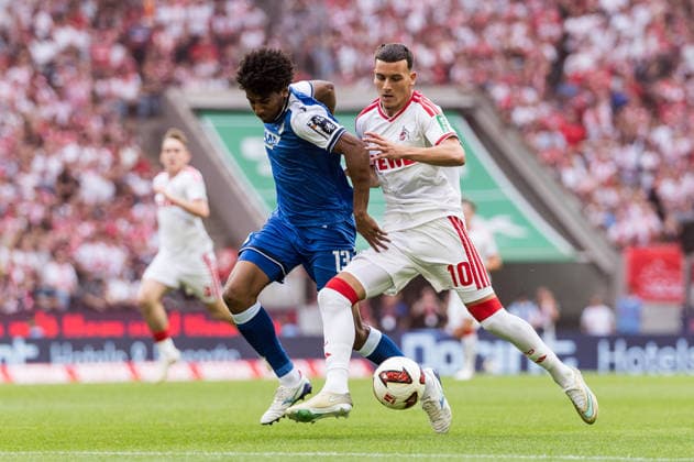 KOELN, GERMANY - AUGUST 29: Said El Mala (1. FC Koeln, 10) controls the ball against Bernardo (TSG 1899 Hoffenheim, 13) during the Bundesliga match between 1. FC Koeln vs. TSG 1899 Hoffenheim at Rheinenergie-Stadion on matchday 1 of the 1. Bundesliga on August 29, 2026 in Koeln, Germany. DFL REGULATIONS PROHIBIT ANY USE OF PHOTOGRAPHS AS IMAGE SEQUENCES AND OR QUASI-VIDEO. North Rhine Westphalia Germany Copyright: xSteffiexWunderlx