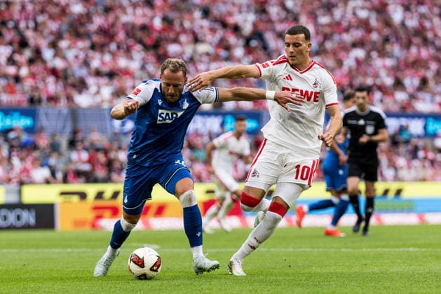 KOELN, GERMANY - AUGUST 29: Vladimir Coufal (TSG 1899 Hoffenheim, 34) controls the ball against Said El Mala (1. FC Koeln, 10) during the Bundesliga match between 1. FC Koeln vs. TSG 1899 Hoffenheim at Rheinenergie-Stadion on matchday 1 of the 1. Bundesliga on August 29, 2026 in Koeln, Germany. DFL REGULATIONS PROHIBIT ANY USE OF PHOTOGRAPHS AS IMAGE SEQUENCES AND OR QUASI-VIDEO. North Rhine Westphalia Germany Copyright: xSteffiexWunderlx