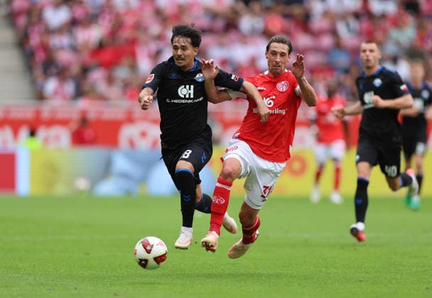 29.08.2026, Fussball Bundesliga, 1. FSV Mainz 05 - SC Paderborn, v.l., Laurin Ulrich (SC Paderborn), Dominik Kohr (FSV Mainz 05) DFL DFB REGULATIONS PROHIBIT ANY USE OF PHOTOGRAPHS AS IMAGE SEQUENCES AND OR QUASI-VIDEO. xdcx *** August 29, 2026, Bundesliga Soccer, 1. FSV Mainz 05 vs. SC Paderborn, from left, Laurin Ulrich, SC Paderborn; Dominik Kohr, FSV Mainz 05. DFL and DFB regulations prohibit any use of photographs as image sequences and or quasi-video. xdcx Copyright: HMBxMedia Claus