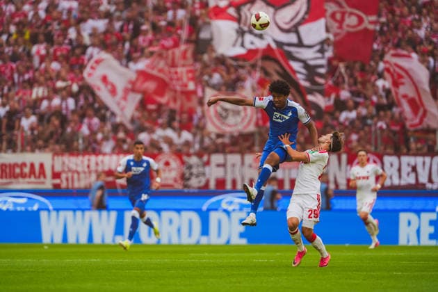 Zweikampf zwischen Bernardo (TSG Hoffenheim, 13) und Jan Thielmann (1.FC Koeln, 29) 1.FC Köln vs. TSG Hoffenheim, Fussball, Bundesliga, 1.Spieltag, Saison 2026 27, 29.08.2026, DFL REGULATIONS PROHIBIT ANY USE OF PHOTOGRAPHS AS IMAGE SEQUENCES AND OR QUASI-VIDEO, 1.FC Köln vs. TSG Hoffenheim, Fussball, Bundesliga, 1.Spieltag, Saison 2026 27, 29.08.2026 Köln *** Tackle between Bernardo (TSG Hoffenheim, 13) and Jan Thielmann (1. FC Köln, 29) – 1. FC Köln vs. TSG Hoffenheim, Soccer, Bundesliga, Matchday 1, 2026–27 season, August 29, 2026, DFL regulations prohibit any use of photographs as image sequences and or quasi-video, 1. FC Köln vs. TSG Hoffenheim, soccer, Bundesliga, Matchday 1, 2026–27 Season, August 29, 2026, Cologne Copyright: xEibner-Pressefoto LukasxBaldygax EP_LBA