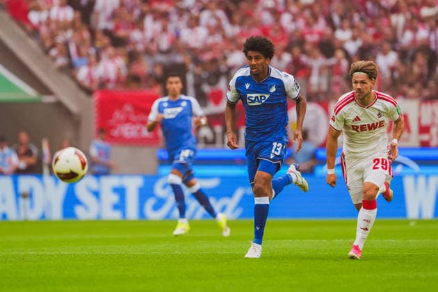 Bernardo (TSG Hoffenheim, 13) im Laufduell mirJan Thielmann (1.FC Koeln, 29) 1.FC Köln vs. TSG Hoffenheim, Fussball, Bundesliga, 1.Spieltag, Saison 2026 27, 29.08.2026, DFL REGULATIONS PROHIBIT ANY USE OF PHOTOGRAPHS AS IMAGE SEQUENCES AND OR QUASI-VIDEO, 1.FC Köln vs. TSG Hoffenheim, Fussball, Bundesliga, 1.Spieltag, Saison 2026 27, 29.08.2026 Köln *** Bernardo (TSG Hoffenheim), No. 13, in a footrace with Jan Thielmann (1. FC Köln), No. 29; 1. FC Köln vs. TSG Hoffenheim, Soccer, Bundesliga, Matchday 1, 2026–27 Season, August 29, 2026, DFL regulations prohibit any use of photographs as image sequences and or quasi-video, 1. FC Köln vs. TSG Hoffenheim, Soccer, Bundesliga, Matchday 1, 2026–27 Season, August 29, 2026, Cologne Copyright: xEibner-Pressefoto LukasxBaldygax EP_LBA
