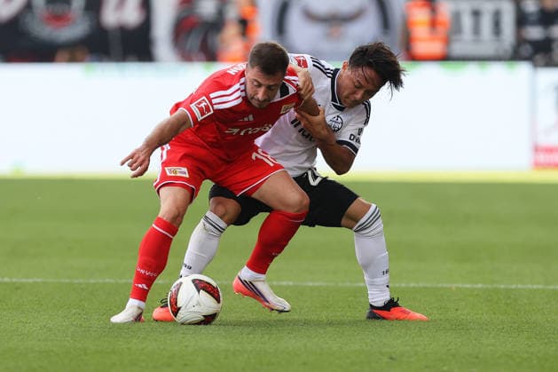 29.08.2026, xtgx, Fussball 1.Bundesliga, Union Berlin - Eintracht Frankfurt v.l. Josip Juranovic (1. FC Union Berlin) Keita Kosugi (Eintracht Frankfurt) Zweikampf, Aktion, action, battle for the ball Berlin *** August 29, 2026, xtgx, Soccer, Bundesliga 1, Union Berlin vs. Eintracht Frankfurt, Josip Juranovic (1. FC Union Berlin) vs. Keita Kosugi (Eintracht Frankfurt), tackle, action, battle for the ball, Berlin