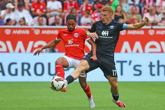 Mainz, Deutschland 29. August 2026: 1. BL - 2026 2027 - Sp. 1 - 1. FSV Mainz 05 gegen SC Paderborn 07 Im Bild: v. li. im Zweikampf Phillipp Mwene (FSV) gegen Laurin Curda (SCP). DFL regulations prohibit any use of photographs as image sequences and or quasi-video Mewa Arena Rheinland - Pfalz *** Mainz, Germany, August 29, 2026, Bundesliga 1, 2026–2027 Season, Matchday 1, 1:00 PM, FSV Mainz 05 vs. SC Paderborn 07. Pictured from left in a tackle: Phillipp Mwene (FSV) vs. Laurin Curda (SCP). DFL regulations prohibit any use of photographs as image sequences and or quasi-video. Mewa Arena, Rhineland-Palatinate Copyright: xFotostandx xRacochax