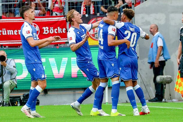 29.08.2026, xsscx, Fußball, 1. FC Köln - TSG Hoffenheim, 1. Fußball Bundesliga Herren, 1. Spieltag, RheinEnergie-STADION, Saison 2026 2027: Torjubel nach dem Tor zum 0:1 durch Torschuetze Adam Daghim (TSG Hoffenheim 14) von Wouter Burger (TSG Hoffenheim 18) Bambase Conte (TSG Hoffenheim 20) DFB regulations prohibit any use of photographs as image sequences and or quasi-video. Photo: xSandraxScherningxPressefotoKochx Nordrhein-Westfalen Deutschland *** August 29, 2026, xsscx, Soccer, 1. FC Köln vs. TSG Hoffenheim, 1. Bundesliga Men, Matchday 1, RheinEnergie STADION, 2026–2027 Season: Goal celebration after the 0–1 goal scored by Adam Daghim (TSG Hoffenheim 14), assisted by Wouter Burger (TSG Hoffenheim 18) and Bambase Conte (TSG Hoffenheim 20). DFB regulations prohibit any use of photographs as image sequences and or quasi- video. Photo: xSandraxScherningxPressefotoKochx, North Rhine-Westphalia, Germany