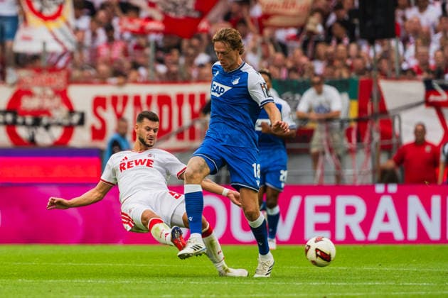 05koe graetscht Wouter Burger (TSG Hoffenheim, 18) den Ball weg 1.FC Köln vs. TSG Hoffenheim, Fussball, Bundesliga, 1.Spieltag, Saison 2026 27, 29.08.2026, DFL REGULATIONS PROHIBIT ANY USE OF PHOTOGRAPHS AS IMAGE SEQUENCES AND OR QUASI-VIDEO, 1.FC Köln vs. TSG Hoffenheim, Fussball, Bundesliga, 1.Spieltag, Saison 2026 27, 29.08.2026 Köln *** 05koe tackles Wouter Burger of TSG Hoffenheim, 18, and clears the ball away—1 FC Köln vs. TSG Hoffenheim, Soccer, Bundesliga, Matchday 1, 2026–27 season, August 29, 2026, DFL regulations prohibit any use of photographs as image sequences and or quasi-video, 1. FC Köln vs. TSG Hoffenheim, Soccer, Bundesliga, Matchday 1, 2026–27 Season, August 29, 2026, Cologne Copyright: xEibner-Pressefoto LukasxBaldygax EP_LBA