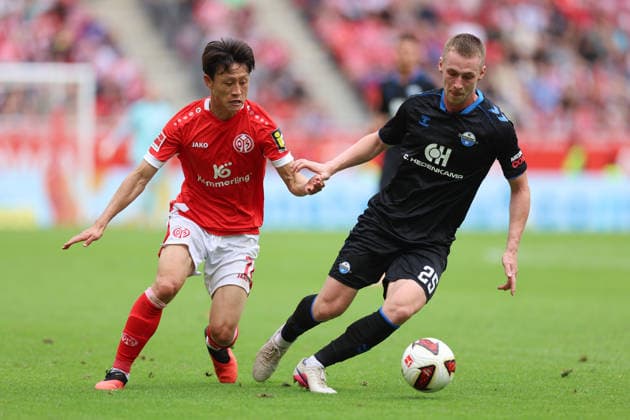 29.08.2026, Fussball Bundesliga, 1. FSV Mainz 05 - SC Paderborn, v.l., Jae-sung Lee (FSV Mainz 05), Tjark Scheller (SC Paderborn) DFL DFB REGULATIONS PROHIBIT ANY USE OF PHOTOGRAPHS AS IMAGE SEQUENCES AND OR QUASI-VIDEO. xdcx *** August 29, 2026, Bundesliga, 1 FSV Mainz 05 vs. SC Paderborn, from left: Jae-sung Lee (FSV Mainz 05), Tjark Scheller (SC Paderborn). DFL and DFB regulations prohibit any use of photographs as image sequences and or quasi-video. xdcx Copyright: HMBxMedia Claus