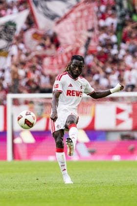 KOELN, GERMANY - AUGUST 29: Gideon Mensah (1. FC Koeln, 14) controls the ball during the Bundesliga match between 1. FC Koeln vs. TSG 1899 Hoffenheim at Rheinenergie-Stadion on matchday 1 of the 1. Bundesliga on August 29, 2026 in Koeln, Germany. DFL REGULATIONS PROHIBIT ANY USE OF PHOTOGRAPHS AS IMAGE SEQUENCES AND OR QUASI-VIDEO. North Rhine Westphalia Germany Copyright: xSteffiexWunderlx