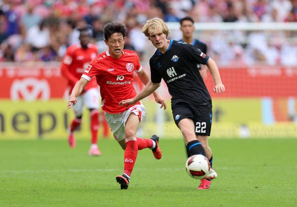 29.08.2026, Fussball Bundesliga, 1. FSV Mainz 05 - SC Paderborn, v.l., Jae-sung Lee (FSV Mainz 05), Mattes Hansen (SC Paderborn) DFL DFB REGULATIONS PROHIBIT ANY USE OF PHOTOGRAPHS AS IMAGE SEQUENCES AND OR QUASI-VIDEO. xdcx *** August 29, 2026, Bundesliga, 1 FSV Mainz 05 vs. SC Paderborn, from left: Jae-sung Lee (FSV Mainz 05), Mattes Hansen (SC Paderborn). DFL and DFB regulations prohibit any use of photographs as image sequences and or quasi-video. xdcx Copyright: HMBxMedia Claus