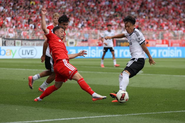 29.08.2026, xtgx, Fussball 1.Bundesliga, Union Berlin - Eintracht Frankfurt v.l. Josip Juranovic (1. FC Union Berlin) Keita Kosugi (Eintracht Frankfurt) Zweikampf, Aktion, action, battle for the ball Berlin *** August 29, 2026, xtgx, Soccer, Bundesliga 1, Union Berlin vs. Eintracht Frankfurt, Josip Juranovic (1. FC Union Berlin) vs. Keita Kosugi (Eintracht Frankfurt), tackle, action, battle for the ball, Berlin