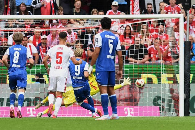 Torwart Marvin Schwaebe (1. FC Koeln) haelt den Elfmeter von Max Moerstedt (TSG Hoffenheim) waehrend des Spiels der 1. Bundesliga zwischen 1. FC Koeln und TSG Hoffenheim, RheinEnergieStadion am 29. August 2026 in Koeln, Deutschland. (Foto von Ralf Treese DeFodi Images) +++ Torwart Marvin Schwaebe (1. FC Koeln) battle for the ball during the Bundesliga match between 1. FC Koeln and TSG Hoffenheim at RheinEnergieStadion on August 29, 2026 in Cologne, Germany. (Photo by Ralf Treese DeFodi Images) DFB DFL REGULATIONS PROHIBIT ANY USE OF PHOTOGRAPHS AS IMAGE SEQUENCES AND OR QUASI-VIDEO. (Photo by Ralf Treese DeFodi Images) - *** Goalkeeper Marvin Schwaebe of 1. FC Köln saves a penalty kick by Max Moerstedt of TSG Hoffenheim during the Bundesliga match between 1. FC Köln and TSG Hoffenheim, RheinEnergieStadion on August 29, 2026, in Cologne, Germany. Photo by Ralf Treese, DeFodi Images. Goalkeeper Marvin Schwaebe of 1. FC Köln battles for the ball during the Bundesliga match between 1. FC Köln and TSG Hoffenheim at RheinEnergieStadion on August 29, 2026 in Cologne, Germany. Photo by Ralf Treese, DeFodi Images. DFB and DFL regulations prohibit any use of photographs as image sequences and or quasi-video. Photo by Ralf Treese, DeFodi Images.