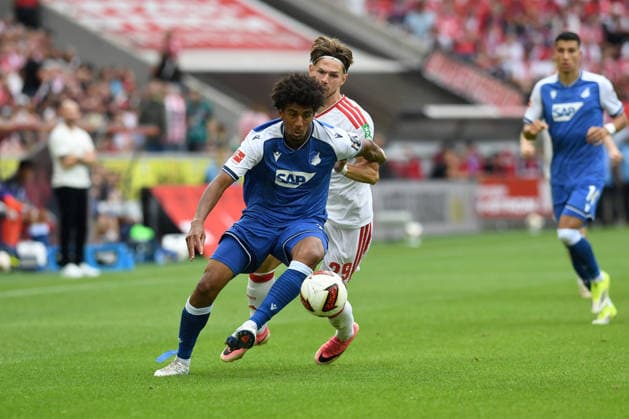 Bernardo (TSG Hoffenheim) und Jan Thielmann (1. FC Koeln) im Zweikampf waehrend des Spiels der 1. Bundesliga zwischen 1. FC Koeln und TSG Hoffenheim, RheinEnergieStadion am 29. August 2026 in Koeln, Deutschland. (Foto von Ralf Treese DeFodi Images) +++ Bernardo (TSG Hoffenheim) und Jan Thielmann (1. FC Koeln) battle for the ball during the Bundesliga match between 1. FC Koeln and TSG Hoffenheim at RheinEnergieStadion on August 29, 2026 in Cologne, Germany. (Photo by Ralf Treese DeFodi Images) DFB DFL REGULATIONS PROHIBIT ANY USE OF PHOTOGRAPHS AS IMAGE SEQUENCES AND OR QUASI-VIDEO. (Photo by Ralf Treese DeFodi Images) - *** Bernardo of TSG Hoffenheim and Jan Thielmann of 1. FC Köln battle for the ball during the Bundesliga match between 1. FC Köln and TSG Hoffenheim at RheinEnergieStadion on August 29, 2026, in Cologne, Germany Photo by Ralf Treese DeFodi Images Bernardo of TSG Hoffenheim and Jan Thielmann of 1. FC Köln battle for the ball during the Bundesliga match between 1. FC Köln and TSG Hoffenheim at RheinEnergieStadion on August 29, 2026 in Cologne, Germany. Photo by Ralf Treese, DeFodi Images. DFB and DFL regulations prohibit any use of photographs as image sequences and or quasi-video. Photo by Ralf Treese, DeFodi Images.