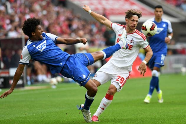 Bernardo (TSG Hoffenheim) und Jan Thielmann (1. FC Koeln) im Zweikampf waehrend des Spiels der 1. Bundesliga zwischen 1. FC Koeln und TSG Hoffenheim, RheinEnergieStadion am 29. August 2026 in Koeln, Deutschland. (Foto von Ralf Treese DeFodi Images) +++ Bernardo (TSG Hoffenheim) und Jan Thielmann (1. FC Koeln) battle for the ball during the Bundesliga match between 1. FC Koeln and TSG Hoffenheim at RheinEnergieStadion on August 29, 2026 in Cologne, Germany. (Photo by Ralf Treese DeFodi Images) DFB DFL REGULATIONS PROHIBIT ANY USE OF PHOTOGRAPHS AS IMAGE SEQUENCES AND OR QUASI-VIDEO. (Photo by Ralf Treese DeFodi Images) - *** Bernardo of TSG Hoffenheim and Jan Thielmann of 1. FC Köln battle for the ball during the Bundesliga match between 1. FC Köln and TSG Hoffenheim at RheinEnergieStadion on August 29, 2026, in Cologne, Germany Photo by Ralf Treese DeFodi Images Bernardo of TSG Hoffenheim and Jan Thielmann of 1. FC Köln battle for the ball during the Bundesliga match between 1. FC Köln and TSG Hoffenheim at RheinEnergieStadion on August 29, 2026 in Cologne, Germany. Photo by Ralf Treese, DeFodi Images. DFB and DFL regulations prohibit any use of photographs as image sequences and or quasi-video. Photo by Ralf Treese, DeFodi Images.
