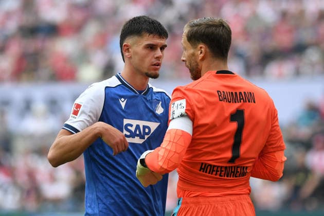 Albian Hajdari (TSG Hoffenheim) und Torwart Oliver Baumann (TSG Hoffenheim) gestikuliert, gestik waehrend des Spiels der 1. Bundesliga zwischen 1. FC Koeln und TSG Hoffenheim, RheinEnergieStadion am 29. August 2026 in Koeln, Deutschland. (Foto von Ralf Treese DeFodi Images) +++ Albian Hajdari (TSG Hoffenheim) und Torwart Oliver Baumann (TSG Hoffenheim) gestures during the Bundesliga match between 1. FC Koeln and TSG Hoffenheim at RheinEnergieStadion on August 29, 2026 in Cologne, Germany. (Photo by Ralf Treese DeFodi Images) DFB DFL REGULATIONS PROHIBIT ANY USE OF PHOTOGRAPHS AS IMAGE SEQUENCES AND OR QUASI-VIDEO. (Photo by Ralf Treese DeFodi Images) - *** Albian Hajdari of TSG Hoffenheim and goalkeeper Oliver Baumann of TSG Hoffenheim gesturing during the Bundesliga match between 1. FC Köln and TSG Hoffenheim at RheinEnergieStadion on August 29, 2026, in Cologne, Germany. Photo by Ralf Treese, DeFodi Images. Albian Hajdari of TSG Hoffenheim and goalkeeper Oliver Baumann of TSG Hoffenheim gesturing during the Bundesliga match between 1. FC Köln and TSG Hoffenheim at RheinEnergieStadion on August 29, 2026 in Cologne, Germany. Photo by Ralf Treese, DeFodi Images. DFB and DFL regulations prohibit any use of photographs as image sequences and or quasi-video. Photo by Ralf Treese, DeFodi Images.