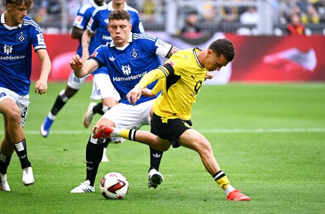 Dortmund, Germany, 1. Bundesliga, Matchday 1, Signal Iduna Park Dortmund, Bor. Dortmund vs Hamburger SV; Konstantinos Karetsas (BVB), Nicolai Remberg (HSV). Action *** Dortmund, Germany, Bundesliga 1, Matchday 1, Signal Iduna Park, Dortmund, Borussia Dortmund vs. Hamburger SV, Konstantinos Karetsas (BVB), Nicolai Remberg (HSV), Action