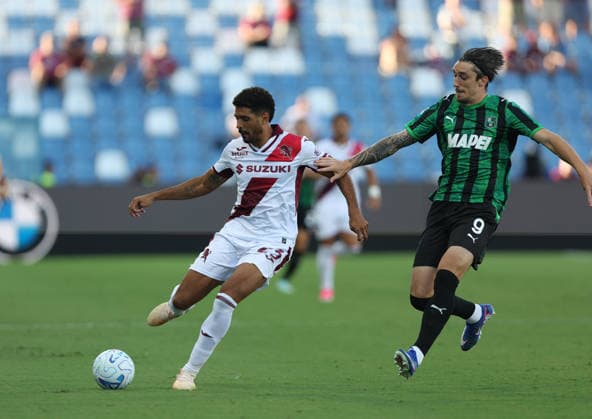 Sassuolo™s Kieron Bowie fights for the ball with Torino™s Saul Coco during the Serie A soccer match between Sassuolo and Torino at the Mapei Stadium in Reggio Emilia, north east Italy - August 29, 2026. - Soccer  Copyright: xGiannixSantandrea LaPressex