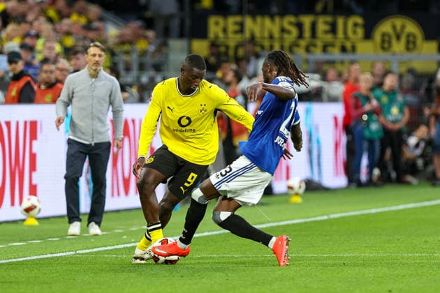 29.08.2026, GER, Fussball, Herren, Bundesliga , Saison 2026 2027, Borussia Dortmund - Hamburger SV Serhou Guirassy (BVB) und Jordan Torunarigha (HSV) im Kampf um den Ball Dortmund Signal-Iduna Park Nordrhein-Westfalen Deutschland *** August 29, 2026, GER, Soccer, Men s, Bundesliga, 2026–2027 Season, Borussia Dortmund vs. Hamburger SV, Serhou Guirassy (BVB) and Jordan Torunarigha (HSV) battle for the ball, Dortmund, Signal Iduna Park, North Rhine-Westphalia, Germany Copyright: xAdrianxSchlüterx