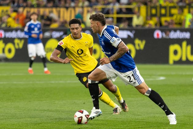 Dortmund, Deutschland 29. August 2026: 1. BL - 2026 2027 - Sp. 1 - Borussia Dortmund gegen Hamburger SV Im Bild: v. li. im Zweikampf Jobe Bellingham (BVB), Nicolai Remberg (HSV) DFL DFB regulations prohibit any use of photographs as image sequences and or quasi-video. Signal Iduna Park Nordrhein Westfalen *** Dortmund, Germany, August 29, 2026, Bundesliga 2026–2027, Matchday 1: Borussia Dortmund vs. Hamburger SV. Pictured, from left, in a tackle: Jobe Bellingham (BVB), Nicolai Remberg (HSV). DFL and DFB regulations prohibit any use of photographs as image sequences and or quasi-video. Signal Iduna Park, North Rhine-Westphalia Copyright: xFotostandx xZeisingx