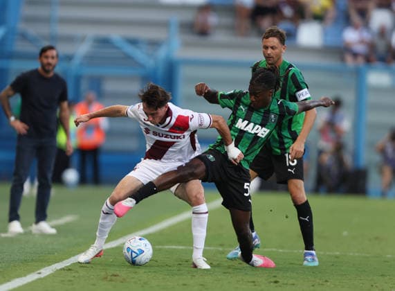 Torino™s Alessio Cacciamani fights for the ball with Sassuolo™s Daryl Bakola during the Serie A soccer match between Sassuolo and Torino at the Mapei Stadium in Reggio Emilia, north east Italy - August1 29, 2026. - Soccer  Copyright: xGiannixSantandrea LaPressex