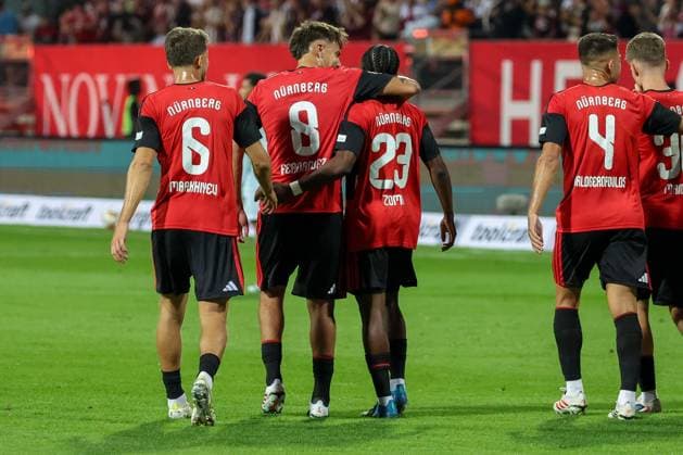 Mohamed Ali Zoma 23 (1FC Nuernberg) nach seinem Tor zum 1:0, Jubel, Freude, Emotion, mit Javier Fernandez 8 (1FC Nuernberg), Adam Markhiyev 6 (1FC Nuernberg), 1. FC Nuernberg vs. DSC Arminia Bielefeld, Fussball, Maenner, 2. Bundesliga, Saison 2026 2027, Hinrunde, 3. Spieltag, 29.08.2026 DFB regulations prohibit any use of photographs as image sequences and or quasi-video Nuernberg Bayern Deutschland *** Mohamed Ali Zoma, 23, of 1. FC Nuremberg, after scoring the 1-0 goal, Celebration, joy, emotion, with Javier Fernandez (8) of 1. FC Nuremberg and Adam Markhiyev (6) of 1. FC Nuremberg; 1. FC Nuremberg vs. DSC Arminia Bielefeld; soccer; men’s; 2. Bundesliga; 2026–2027 season; First Half of the Season, Matchday 3, August 29, 2026. DFB regulations prohibit any use of photographs as image sequences and or quasi-video. Nuremberg, Bavaria, Germany Copyright: xkolbert-press MartinxAgüerax