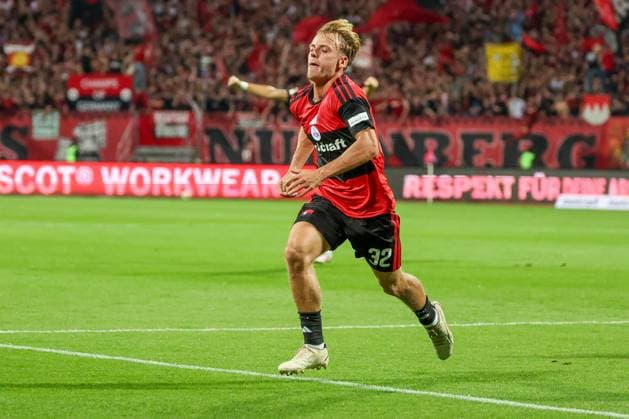 Tim Janisch 32 (1FC Nuernberg) jubelt nach seinem Tor zum 2:0, Freude, Emption, Jubel, 1. FC Nuernberg vs. DSC Arminia Bielefeld, Fussball, Maenner, 2. Bundesliga, Saison 2026 2027, Hinrunde, 3. Spieltag, 29.08.2026 DFB regulations prohibit any use of photographs as image sequences and or quasi-video Nuernberg Bayern Deutschland *** Tim Janisch, 32, of 1. FC Nuremberg celebrates after scoring the goal to make it 2–0—joy, emotion, celebration—1. FC Nuremberg vs. DSC Arminia Bielefeld, soccer, men s, 2. Bundesliga, 2026–2027 season, First half of the season, Matchday 3, August 29, 2026. DFB regulations prohibit any use of photographs as image sequences and or quasi-video. Nuremberg, Bavaria, Germany Copyright: xkolbert-press MartinxAgüerax