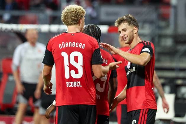 Adam Markhiyev 6 (1FC Nuernberg) jubelt mit Piet Scobel 19 (1 FC Nuernberg) ueber das 4:0, 1. FC Nuernberg vs. DSC Arminia Bielefeld, Fussball, Maenner, 2. Bundesliga, Saison 2026 2027, Hinrunde, 3. Spieltag, 29.08.2026 DFB regulations prohibit any use of photographs as image sequences and or quasi-video Nuernberg Bayern Deutschland *** Adam Markhiyev 6 1. FC Nuremberg celebrates with Piet Scobel 19 1. FC Nuremberg after the 4-0 win, 1. FC Nuremberg vs. DSC Arminia Bielefeld, Soccer, Men, 2. Bundesliga, 2026–2027 season, First Half of the Season, Matchday 3, August 29, 2026. DFB regulations prohibit any use of photographs as image sequences and or quasi-video. Nuremberg, Bavaria, Germany Copyright: xkolbert-press MartinxAgüerax