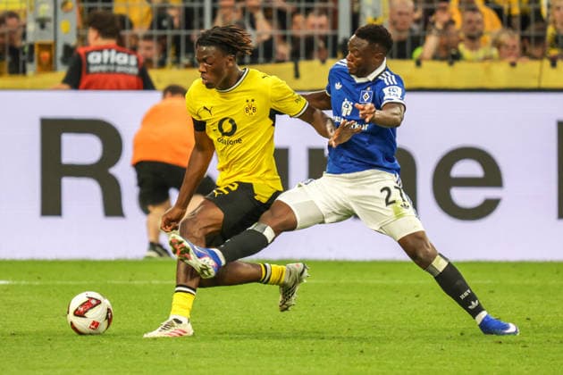 29.08.2026, xgrfx, Fussball 1.Bundesliga, Borussia Dortmund - Hamburger SV v.l. Joane Gadou (Borussia Dortmund), Patson Daka (Hamburger SV) (DFL DFB REGULATIONS PROHIBIT ANY USE OF PHOTOGRAPHS as IMAGE SEQUENCES and or QUASI-VIDEO) Dortmund *** August 29, 2026, xgrfx, Soccer 1st Bundesliga, Borussia Dortmund vs. Hamburger SV, Joane Gadou (Borussia Dortmund), Patson Daka (Hamburger SV). DFL and DFB regulations prohibit any use of photographs as image sequences and or quasi-video. Dortmund