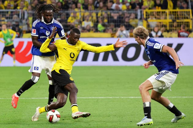 29.08.2026, xgrfx, Fussball 1.Bundesliga, Borussia Dortmund - Hamburger SV v.l. Jordan Torunarigha (Hamburger SV), Serhou Guirassy (Borussia Dortmund) (DFL DFB REGULATIONS PROHIBIT ANY USE OF PHOTOGRAPHS as IMAGE SEQUENCES and or QUASI-VIDEO) Dortmund *** August 29, 2026, xgrfx, Soccer, Bundesliga 1, Borussia Dortmund vs. Hamburger SV, Jordan Torunarigha (Hamburger SV), Serhou Guirassy (Borussia Dortmund). DFL and DFB regulations prohibit any use of photographs as image sequences and or quasi-video. Dortmund