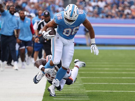 Aug 29, 2026; Nashville, Tennessee, USA; Tennessee Titans tight end Kylen Granson (86) is wrapped up at the ankles by Chicago Bears defensive back Xavier Woods (23) during the NFL, American Football Herren, USA preseason game between the Chicago Bears and the Tennessee Titans at Nissan Stadium (Nashville). Mandatory Credit: -Cal Media NFL 2026: Bears Vs Titans AUG 29  - ZUMAc04_ 20260829_zma_c04_087 Copyright: xStephenxFurstx