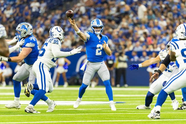 Aug 29, 2026; Indianapolis, Indiana, USA; Detroit Lions quarterback Luke Altmyer (2) passes the ball as Indianapolis Colts defensive lineman Adetomiwa Adebawore (95) pursues during NFL, American Football Herren, USA preseason game action at Lucas Oil Stadium. Mandatory Credit: -Cal Media NFL 2026: Lions Vs Colts AUG 29  - ZUMAc04_ 20260829_zma_c04_095 Copyright: xJohnxMersitsx