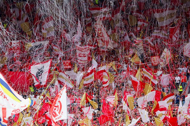 Im Bild: Die Fans vom FSV Mainz 05 mit Fahnen und Konfetti. 29.08.2026, FSV Mainz 05 - SC Paderborn 07, 1. Bundesliga, 1. Spieltag, Deutschland, Mainz, MEWA Arena, DFL REGULATIONS PROHIBIT ANY USE OF PHOTOGRAPHS AS IMAGE SEQUENCES AND OR QUASI-VIDEO. *** Pictured: FSV Mainz 05 fans with flags and confetti, August 29, 2026, FSV Mainz 05 vs. SC Paderborn 07, Bundesliga 1, Matchday 1, Germany, Mainz, MEWA Arena, DFL REGULATIONS PROHIBIT ANY USE OF PHOTOGRAPHS AS IMAGE SEQUENCES AND OR QUASI-VIDEO Copyright: HMBxMedia xJulienxBecker