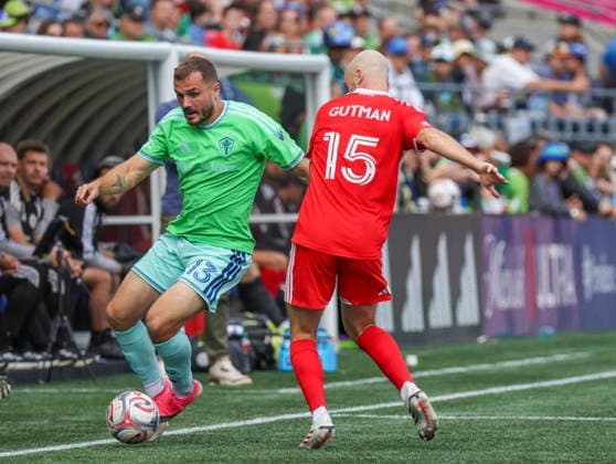 SEATTLE, WA - AUGUST 29: (left to right) Seattle Sounders FC forward Jordan Morris (13) keeps the ball inbounds as Chicago Fire FC defender Andrew Gutman (15) challenges for ball in the second half during the MLS, Fussball Herren, USA match between Chicago Fire FC and Seattle Sounders FC on August 29, 2026 at Lumen Field in Seattle, Washington. (Photo by Leslie Plaza Johnson Icon Sportswire) SOCCER: AUG 29 MLS Seattle Sounders FC vs Chicago Fire FC EDITORIAL USE ONLY Icon260829049