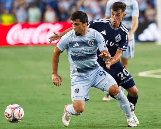 August 29, 2026, Kansas City, Kansas, USA: Sporting KC forward SHAPI SULEYMANOV 93 (l) leads the offense against Vancouver Whitecaps FC midfielder ANDRES CUBAS 20 (r) during the first half of the game at Sporting Park in Kansas City, KS, on August 29, 2026. Kansas City USA - ZUMAh139 20260829_zap_h139_002 Copyright: xSerenaxS.Y.xHsux