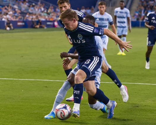 August 29, 2026, Kansas City, Kansas, USA: Vancouver Whitecaps FC defender TATE JOHNSON 28 (center action) recaptures the ball for the defense at the end zone during the first half of the game at Sporting Park in Kansas City, KS, on August 29, 2026. Kansas City USA - ZUMAh139 20260829_zap_h139_004 Copyright: xSerenaxS.Y.xHsux