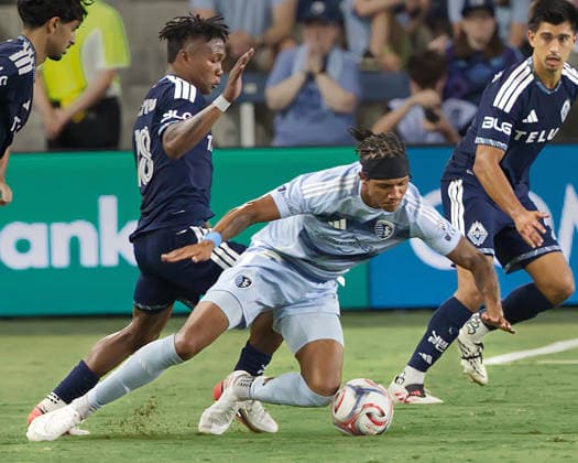 August 29, 2026, Kansas City, Kansas, USA: Vancouver Whitecaps FC defender EDIER OCAMPO 18 (behind-l) concedes a foul on Sporting KC forward CALVIN HARRIS 14 during the second half of the game at Sporting Park in Kansas City, KS, on August 29, 2026. Kansas City USA - ZUMAh139 20260829_zap_h139_007 Copyright: xSerenaxS.Y.xHsux