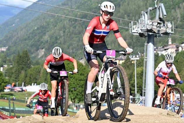 XCO Olympic Cross-Country - Women Under 23 (7) Lisa Katrine Jorde of Norway followed by (16) Rafaelle Carrier of Canada competes during the UCI MTB World Championship, WM, Weltmeisterschaft - Val di Sole 2026 - XCO Olympic Cross-Country - Women Under 23 category race in Val di Sole, Trento, Italy, on August 30, 2026. Commezzadura Trentino Italy  Copyright: xRobertoxTommasinix originalFilename:tommasini-ucimtbwo260830_npKiQ.jpg