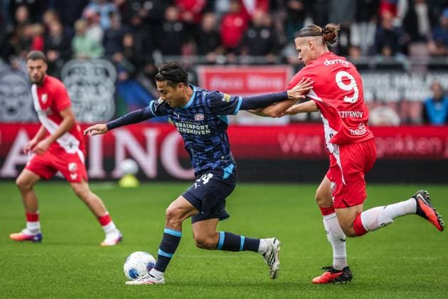 UTRECHT , 30-08-2026 , Stadion Galgenwaard , Season 2026 2027 , Dutch Eredivisie football , match between FC Utrecht and PSV Eindhoven , picture shows PSV player Kodai Sano and FC Utrecht player Artem Stepanov Utrecht - PSV  x206239864x Copyright: