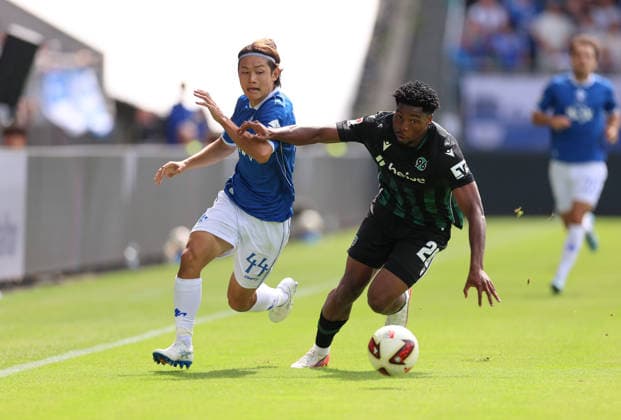 30.08.2026, Fussball 2. Bundesliga, SV Darmstadt 98 - Hannover 96, v.l., Yosuke Furukawa (SV Darmstadt 98), Ime Okon (Hannover 96) DFL DFB REGULATIONS PROHIBIT ANY USE OF PHOTOGRAPHS AS IMAGE SEQUENCES AND OR QUASI-VIDEO. xdcx *** August 30, 2026, Soccer, 2. Bundesliga, SV Darmstadt 98 vs. Hannover 96, from left: Yosuke Furukawa (SV Darmstadt 98), Ime Okon (Hannover 96). DFL and DFB regulations prohibit any use of photographs as image sequences and or quasi-video. xdcx Copyright: HMBxMedia Claus